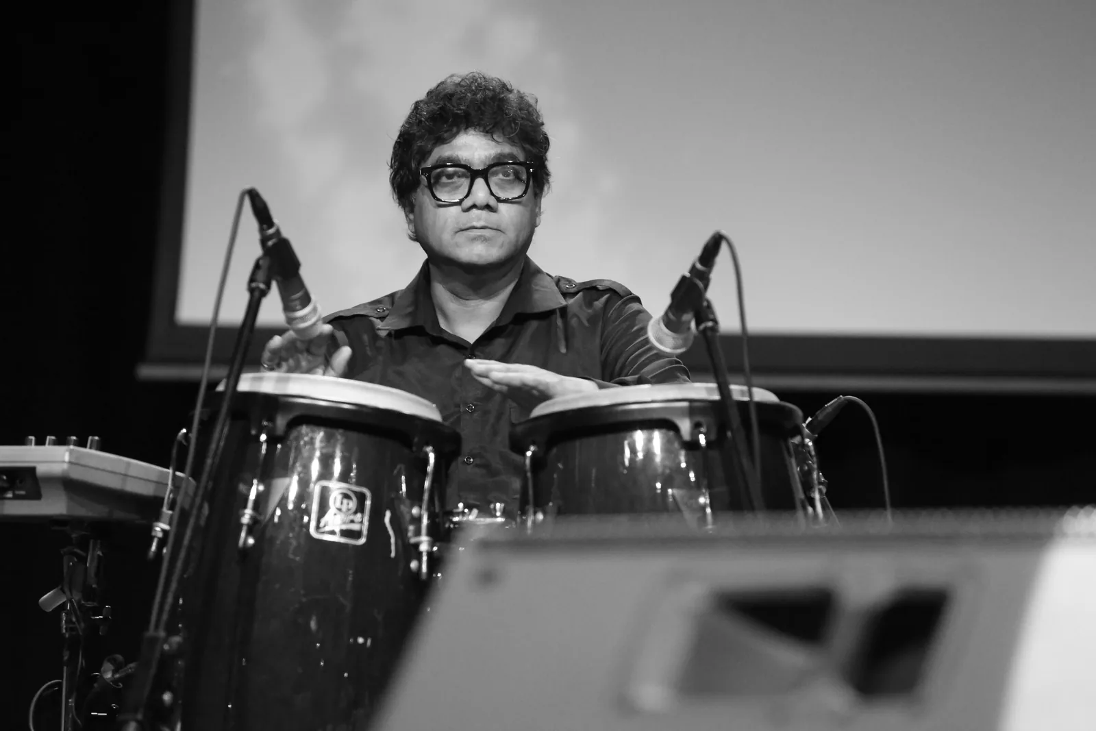 Percussionist at the congas, black and white