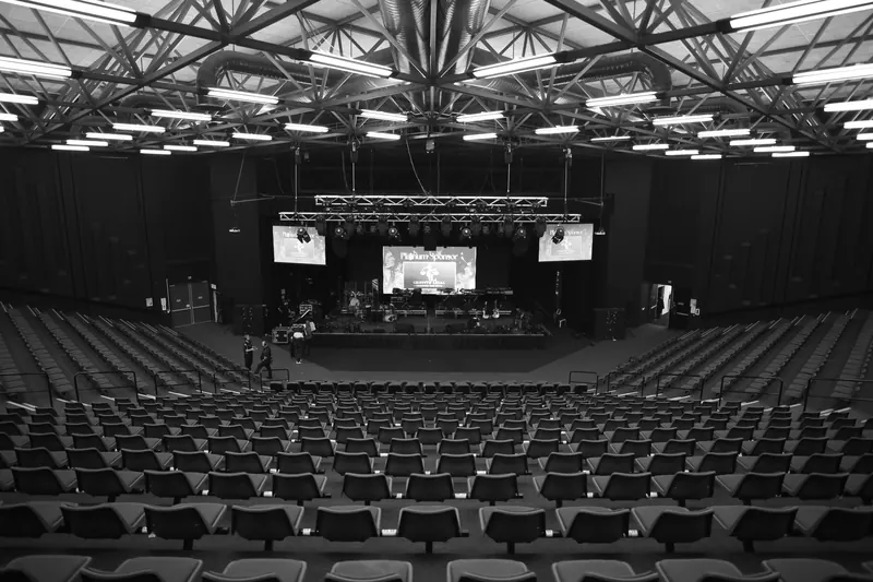 Stage rig and seating before the show, black and white