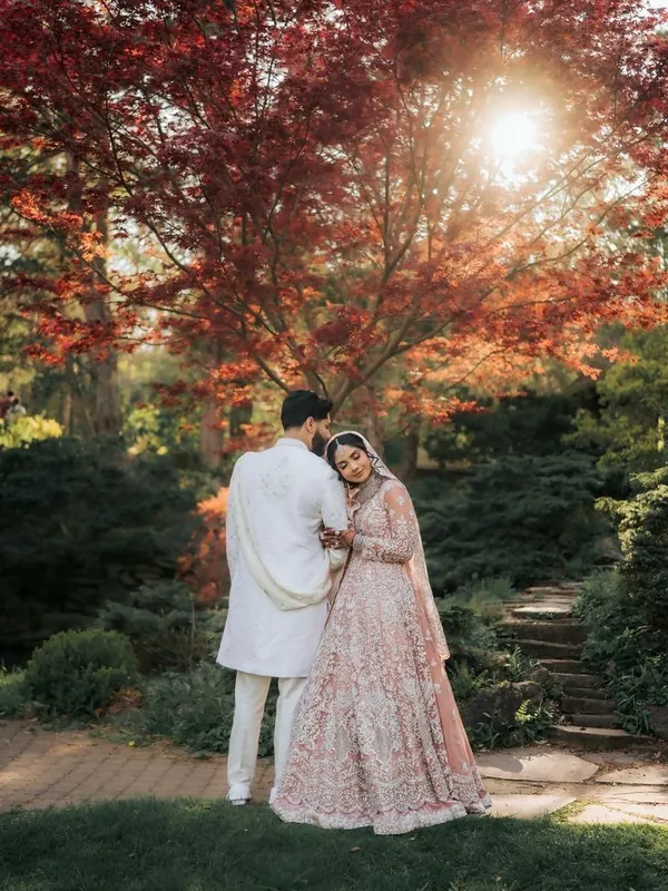 Close portrait of a couple in a garden setting